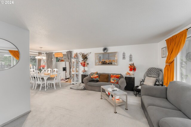 681 Hamlin Dr, Canyonville, OR 97417 - living room featuring a chandelier and carpet floors