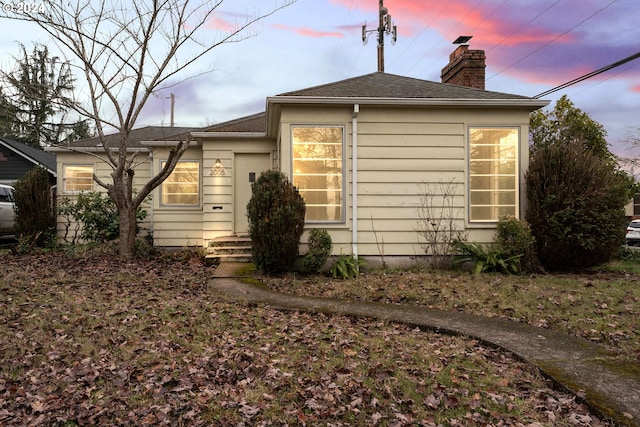 view of property exterior at dusk