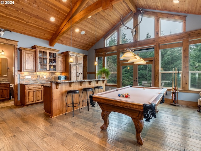 playroom with high vaulted ceiling, light hardwood / wood-style flooring, and billiards