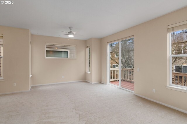 unfurnished dining area featuring baseboards, ceiling fan, and wood finished floors