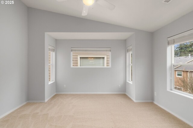 carpeted empty room with baseboards and visible vents