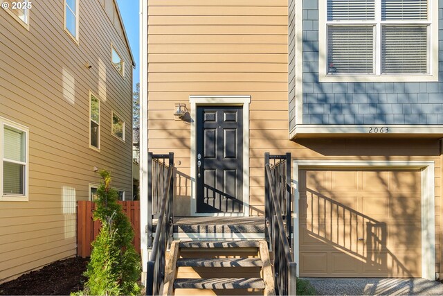 property entrance with fence