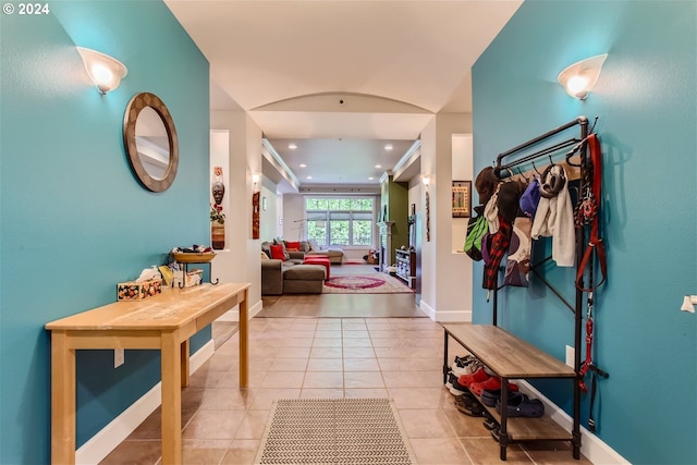 hallway with light tile patterned flooring