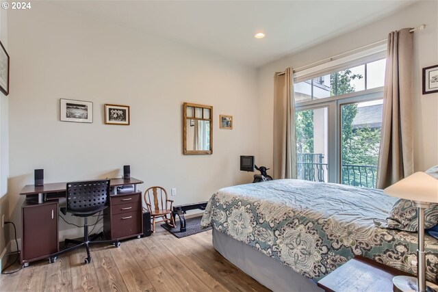 707 N Hayden Island Dr Unit 301, Portland, OR 97217 - bedroom featuring light wood-style flooring, baseboards, recessed lighting, access to outside, and an office area