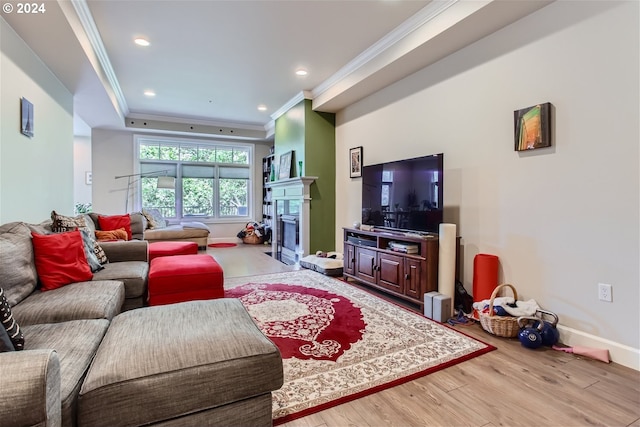 707 N Hayden Island Dr Unit 301, Portland, OR 97217 - living area featuring crown molding, wood finished floors, a fireplace, baseboards, and recessed lighting