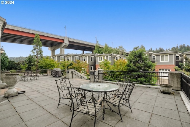 view of patio / terrace featuring a pergola and area for grilling