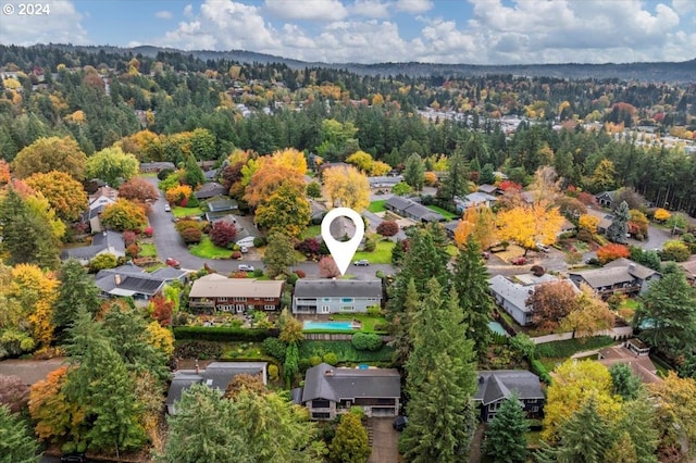 aerial view with a forest view and a residential view
