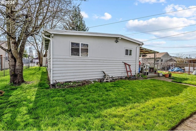 view of home's exterior featuring a yard