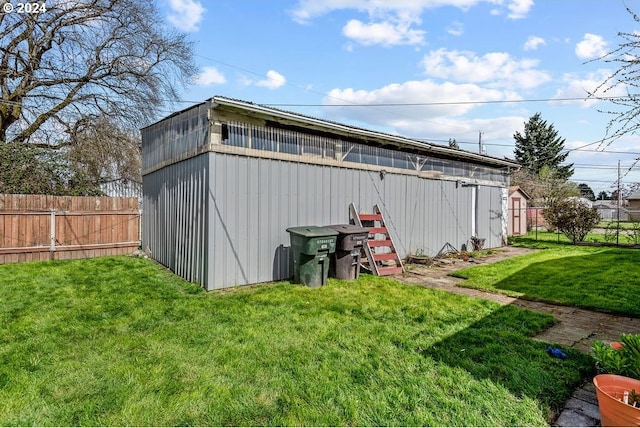 view of outdoor structure featuring a yard