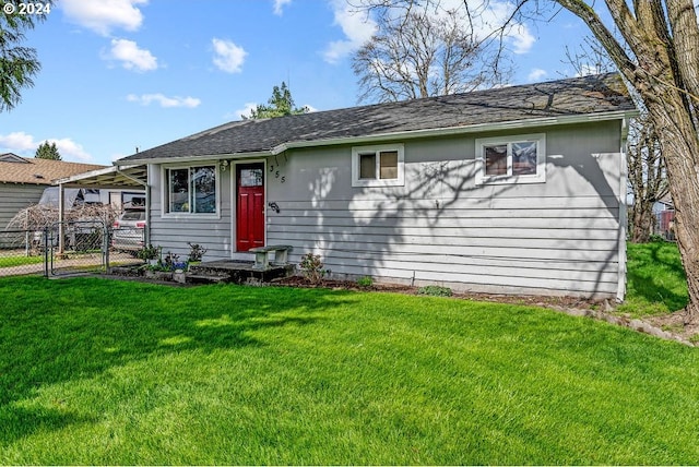 ranch-style home with a front yard