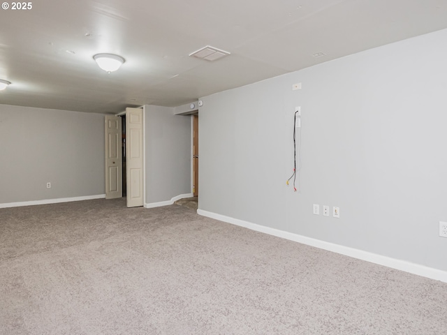 basement featuring carpet flooring