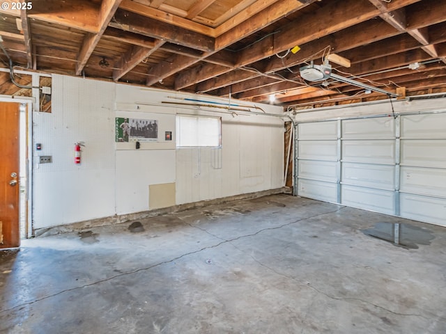 garage featuring a garage door opener