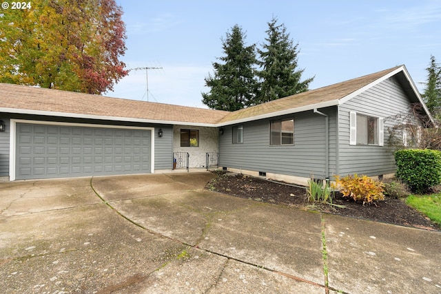 ranch-style house with a garage