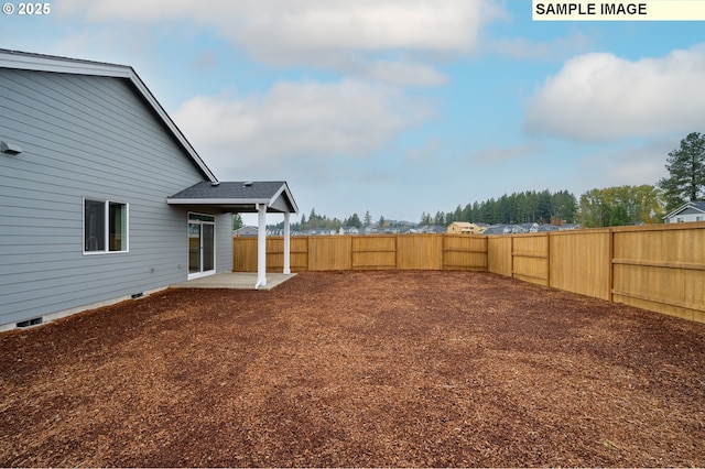 view of yard with a patio area