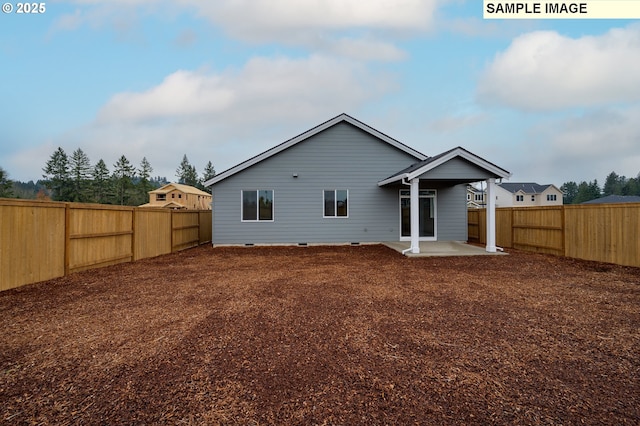 rear view of property featuring a patio