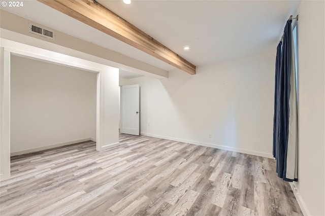 basement featuring light hardwood / wood-style floors