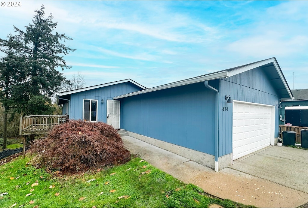 exterior space with a garage