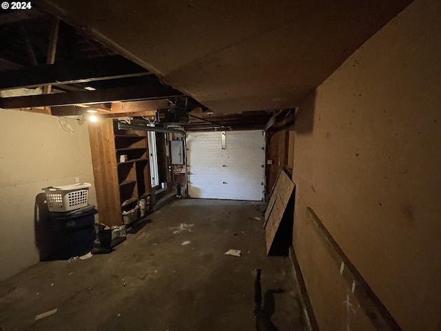 basement featuring electric panel