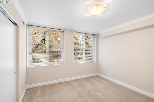 1205 SW Cardinell Dr Unit 802, Portland, OR 97201 - spare room with light colored carpet and ornamental molding