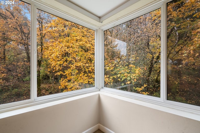 unfurnished sunroom with a healthy amount of sunlight