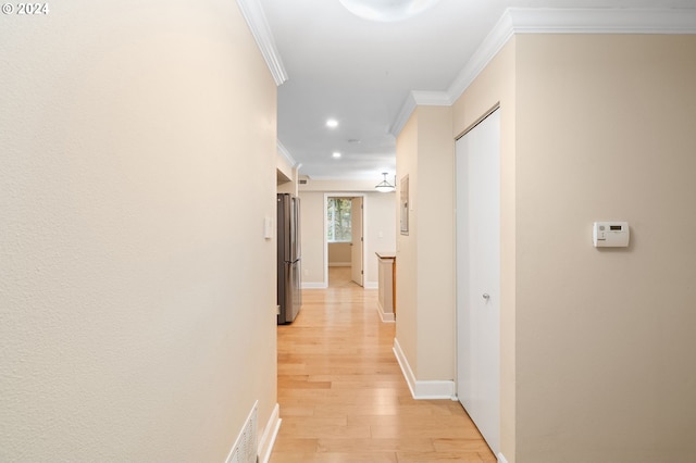 1205 SW Cardinell Dr Unit 802, Portland, OR 97201 - corridor featuring crown molding, recessed lighting, and light wood-style flooring