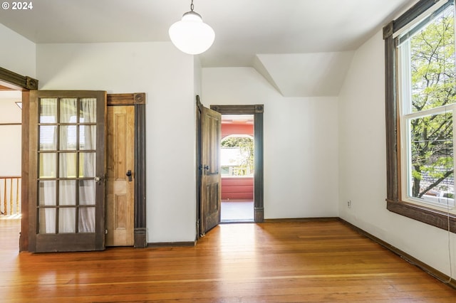 interior space with hardwood / wood-style flooring