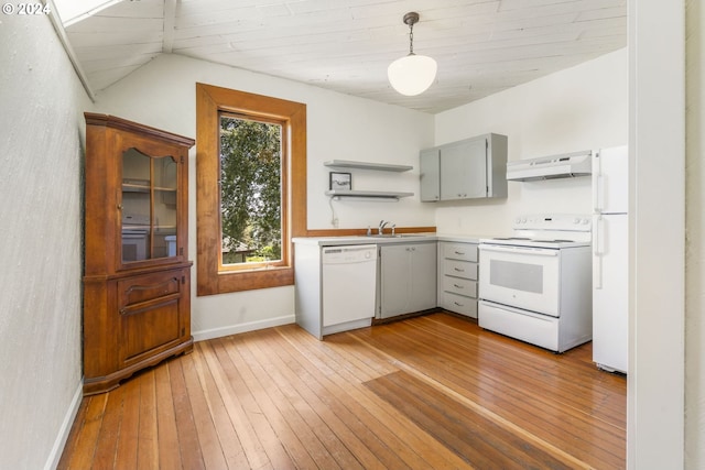 kitchen featuring sink, hanging light fixtures, range hood, white appliances, and light wood-type flooring