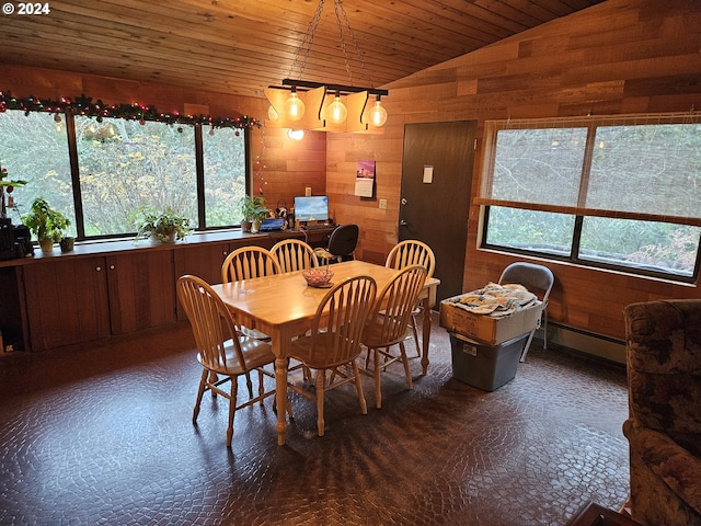 dining space with a baseboard heating unit, vaulted ceiling, wood walls, and wood ceiling