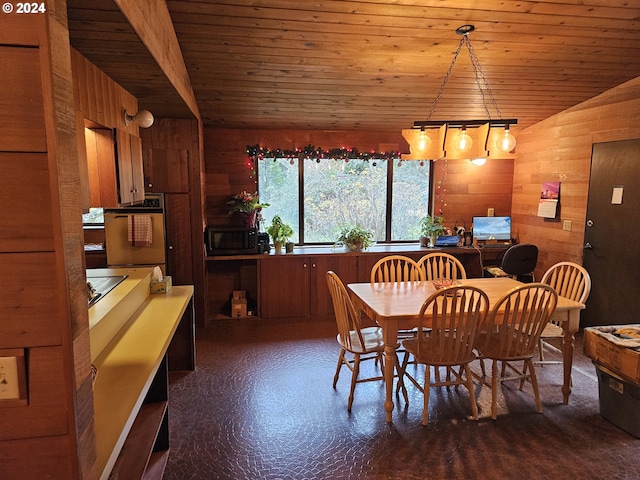 dining area with vaulted ceiling, wood ceiling, and wood walls