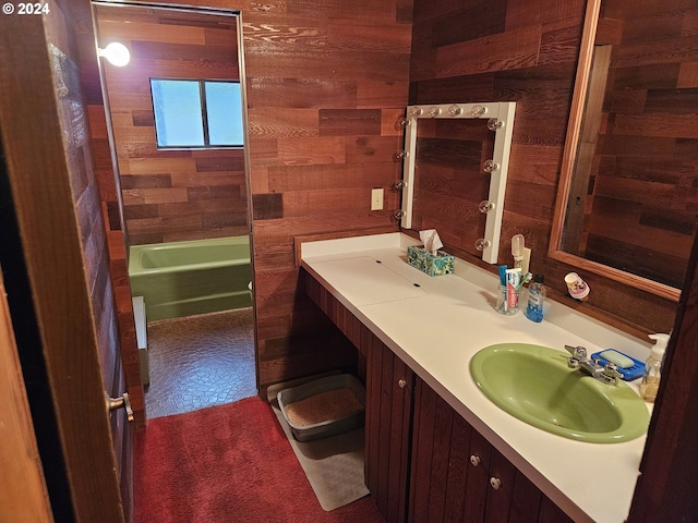 bathroom with wooden walls and vanity