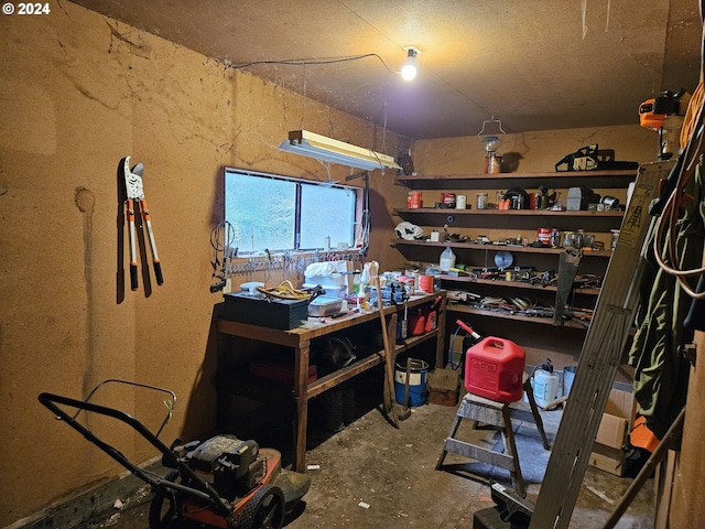 interior space featuring a workshop area and concrete floors