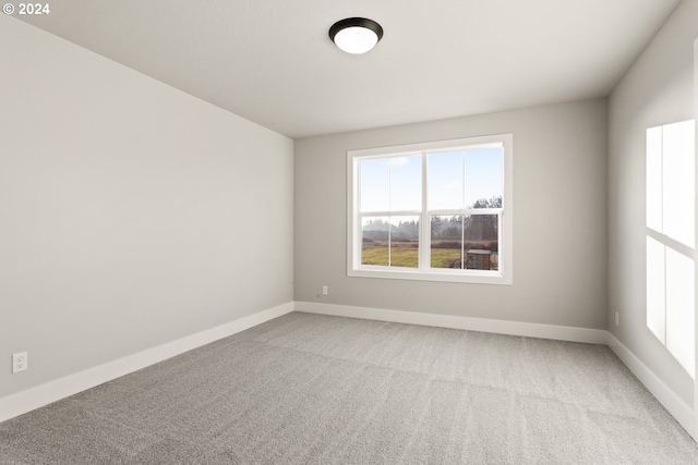 spare room with carpet flooring