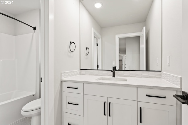 full bathroom with toilet, shower / tub combination, decorative backsplash, and vanity