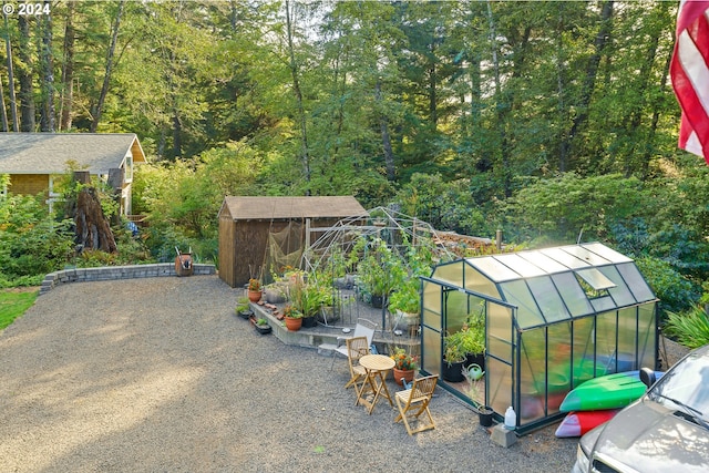 exterior space with a shed