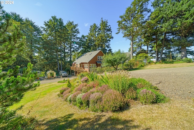 view of yard featuring a deck