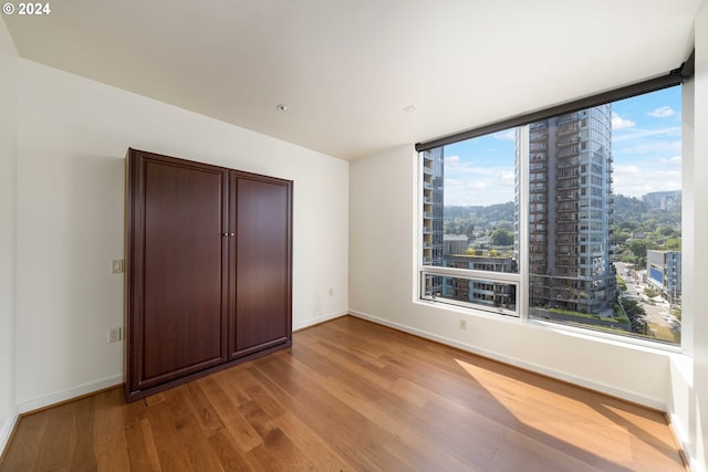 unfurnished bedroom with light hardwood / wood-style floors