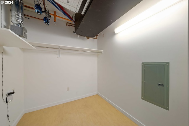 spacious closet featuring electric panel