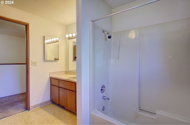 bathroom featuring vanity and shower / bath combination