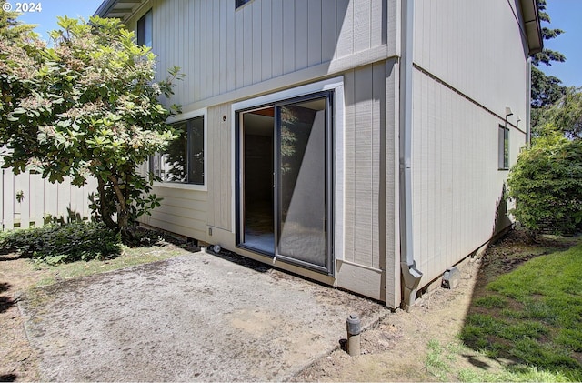 doorway to property featuring a patio