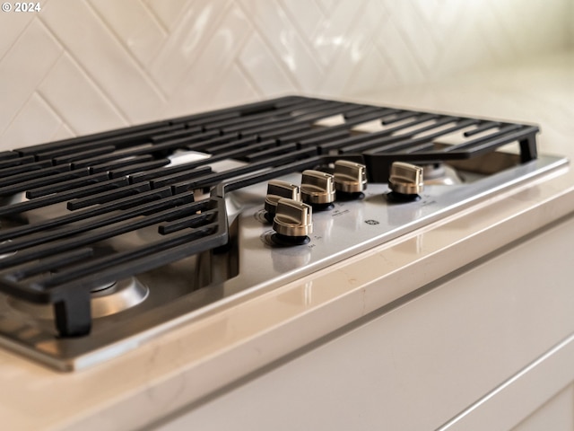 room details with stainless steel gas stovetop