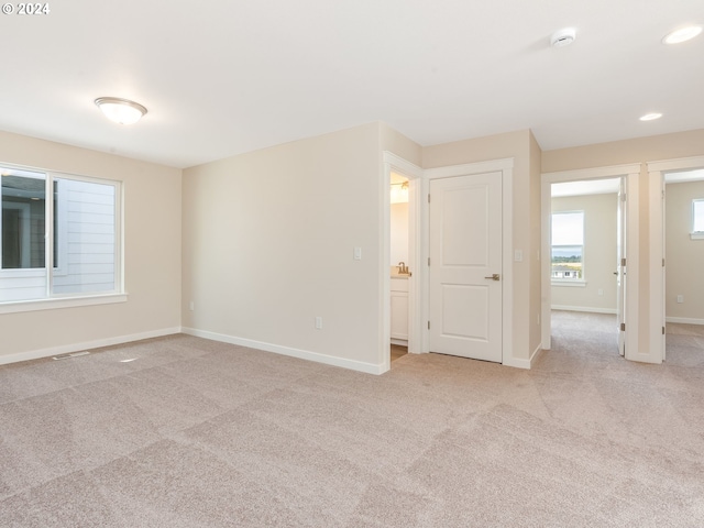 view of carpeted spare room