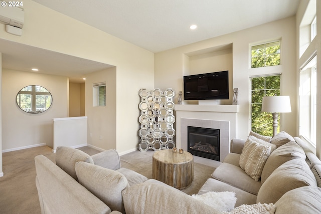 living room with a fireplace and light carpet