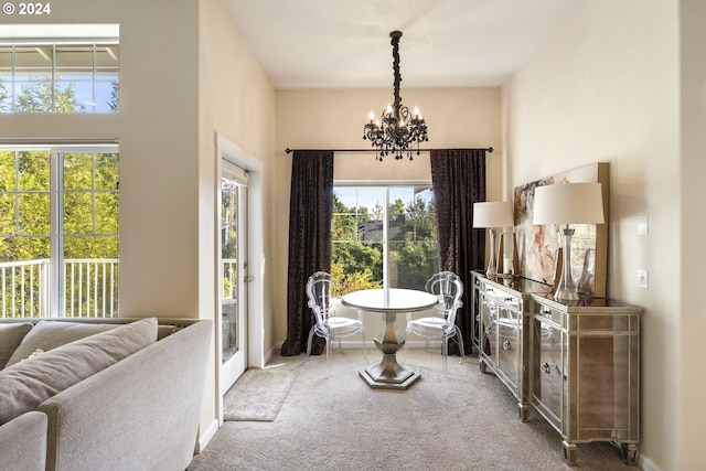 bathroom with a bathing tub and an inviting chandelier