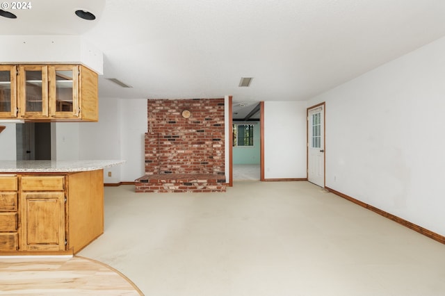 unfurnished living room with light carpet