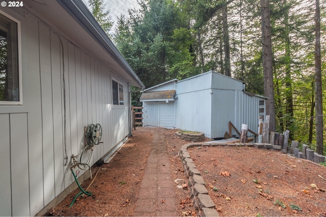 exterior space featuring an outbuilding