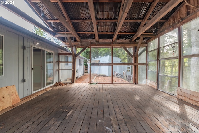 unfurnished sunroom with a healthy amount of sunlight