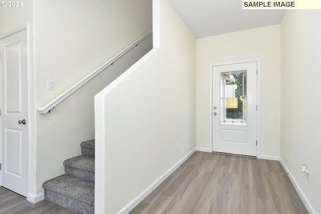 entrance foyer featuring light wood-type flooring