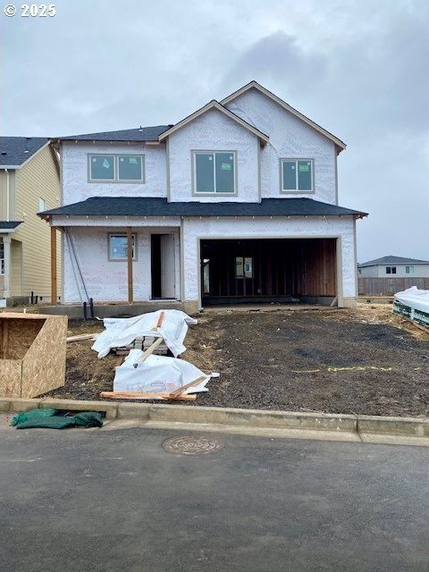 view of front of home with a garage