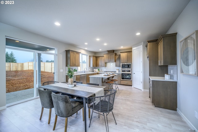 dining space with sink