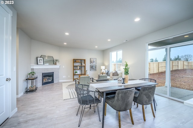 dining area featuring light wood-type flooring